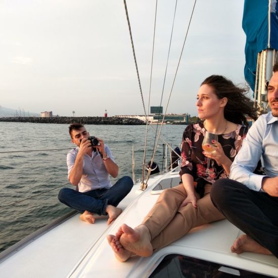 Young couple in holiday, having a photo shooting with a photographer.