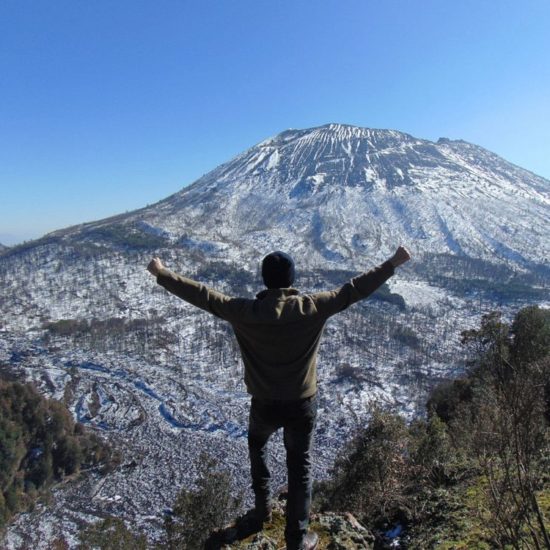 Man getting to the top of the Vesuvius