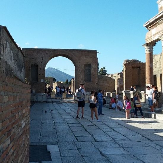 People standing in the foro of Pomepii Ruins